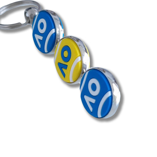 Side View Australian Open 3 Tennis Ball Keyring featuring three spinning 2D tennis balls with the iconic AO logo, perfect for tennis enthusiasts and fans of the Happy Slam.