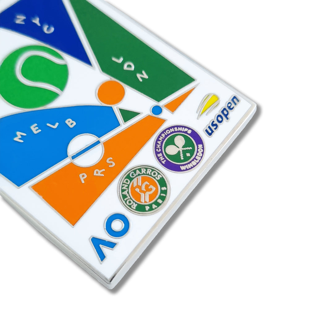 Close up: AO Grand Slam Keyring featuring the logos of Grand Slam Tournaments with a split keyring attachment and a high-quality finish.