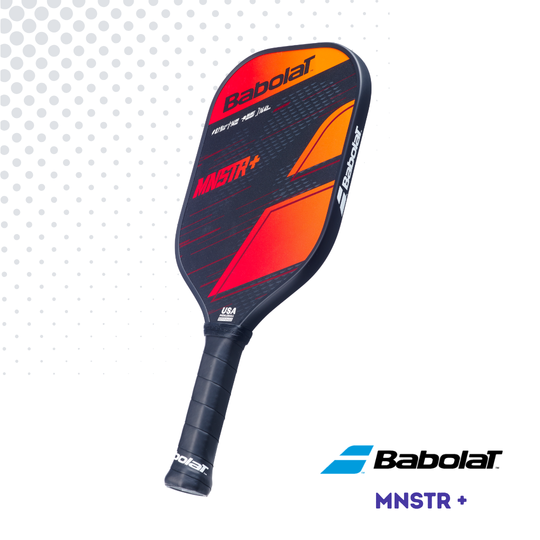 Side right view of the Babolat MNSTR+ paddle, showing the face with orange, red and black graphics against a white background.